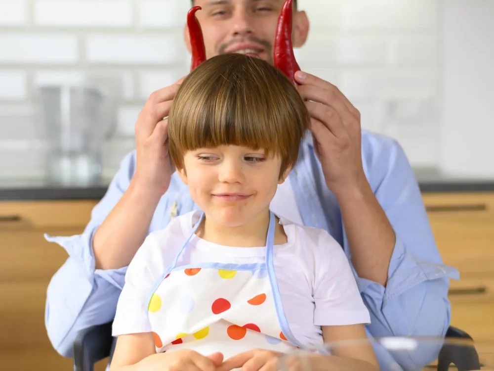 dad-puts-kapia-peppers-child-head
